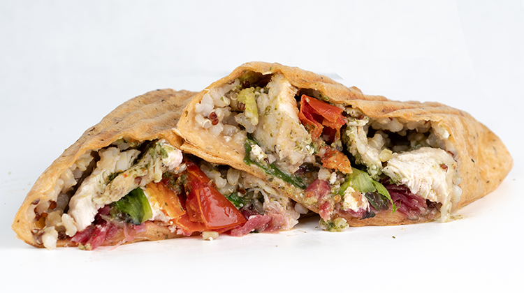 A fresh avocado chicken wrap
